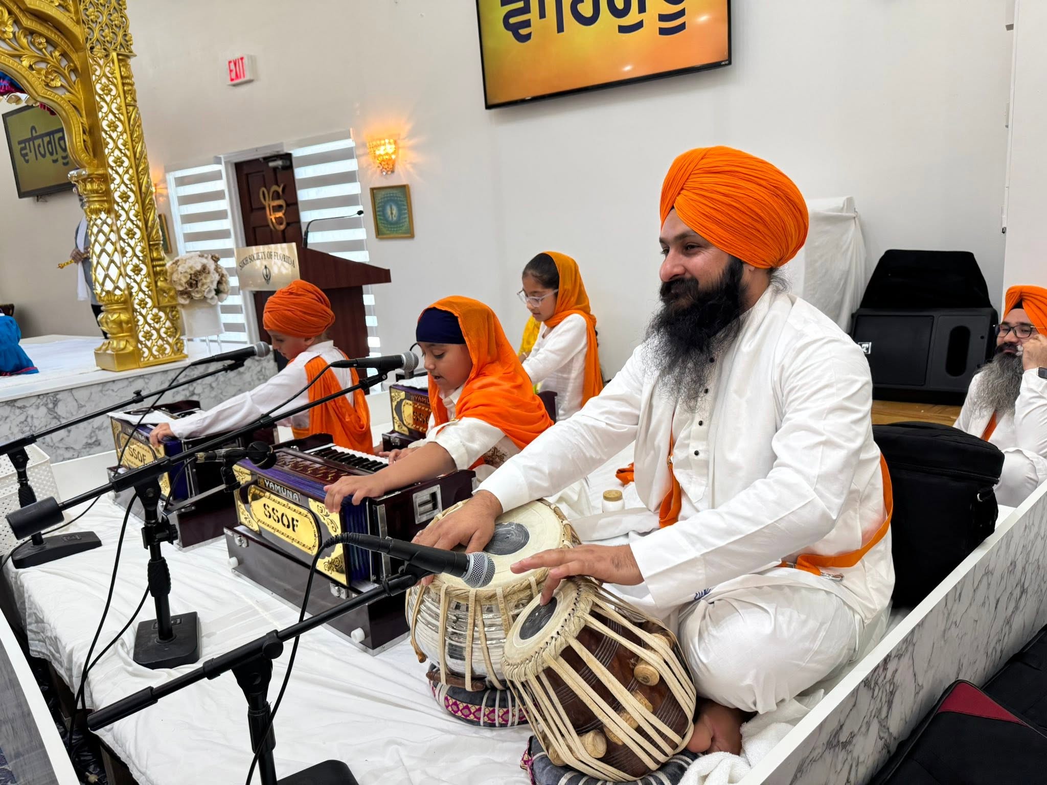 Children performing Kirtan at the Gurdwara